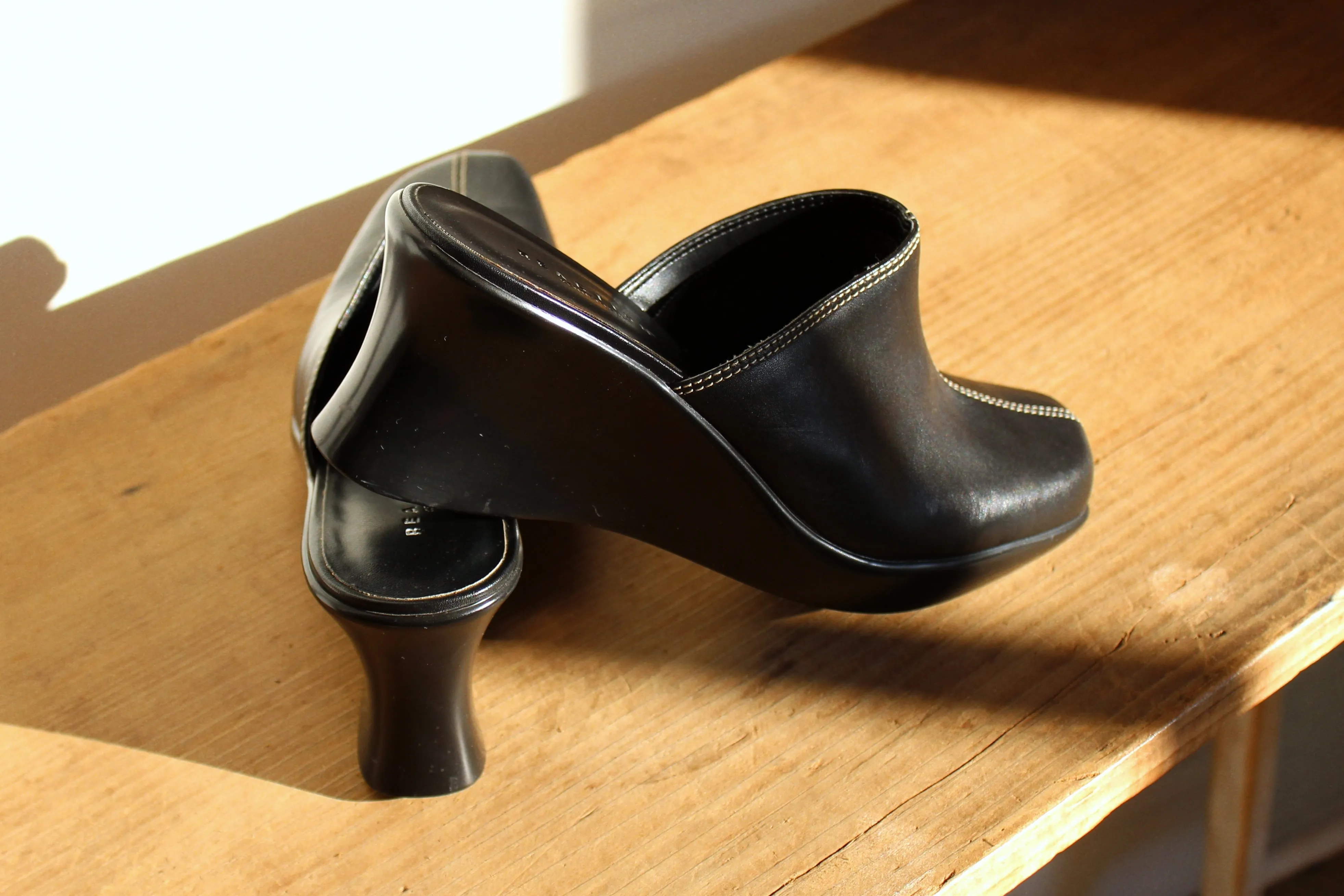 Y2K Reaction by Kenneth Cole Black Leather Wedge Mules w/ White Top Stitching - Size 8M